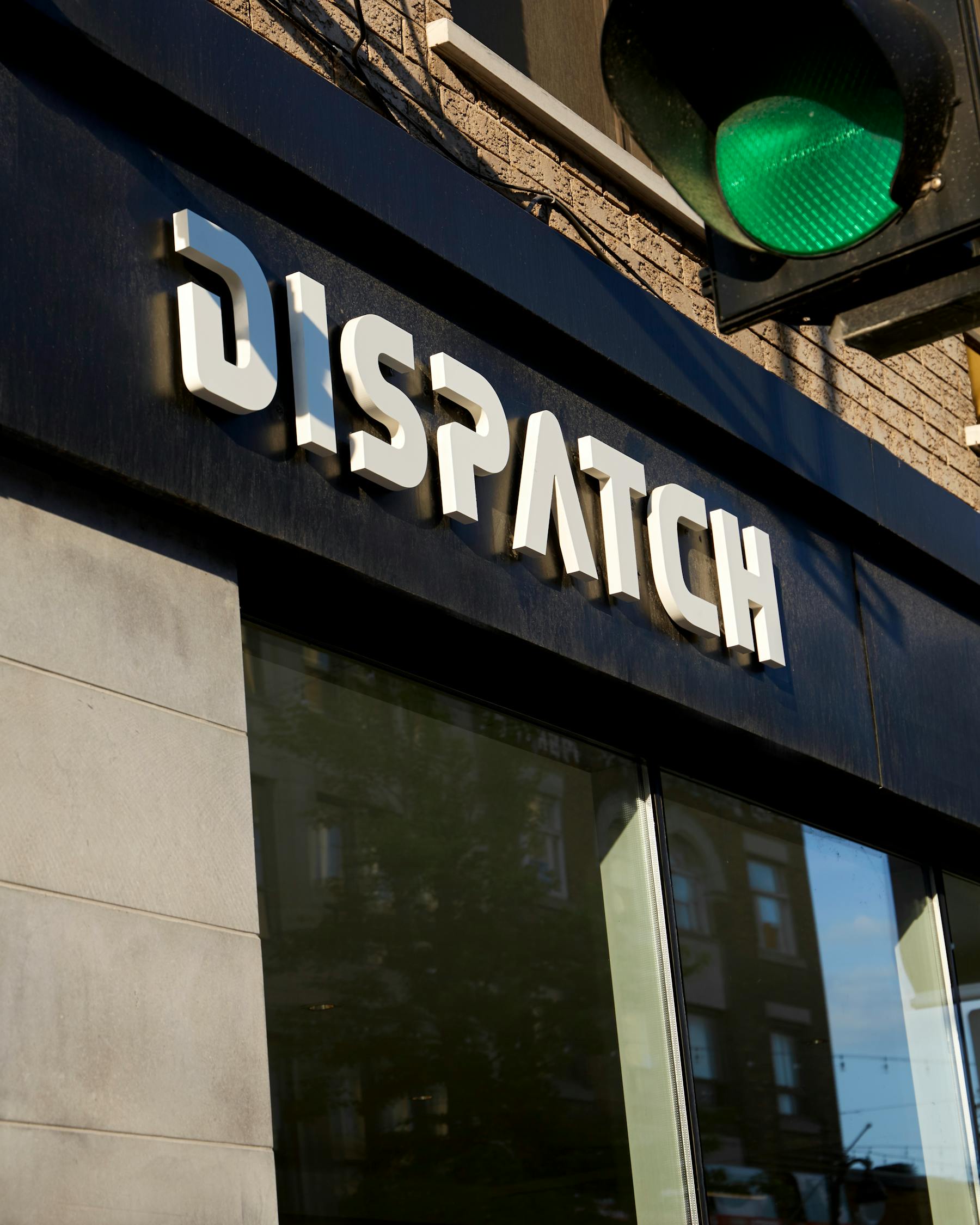 Dispatch Coffee storefront sign, official photograph