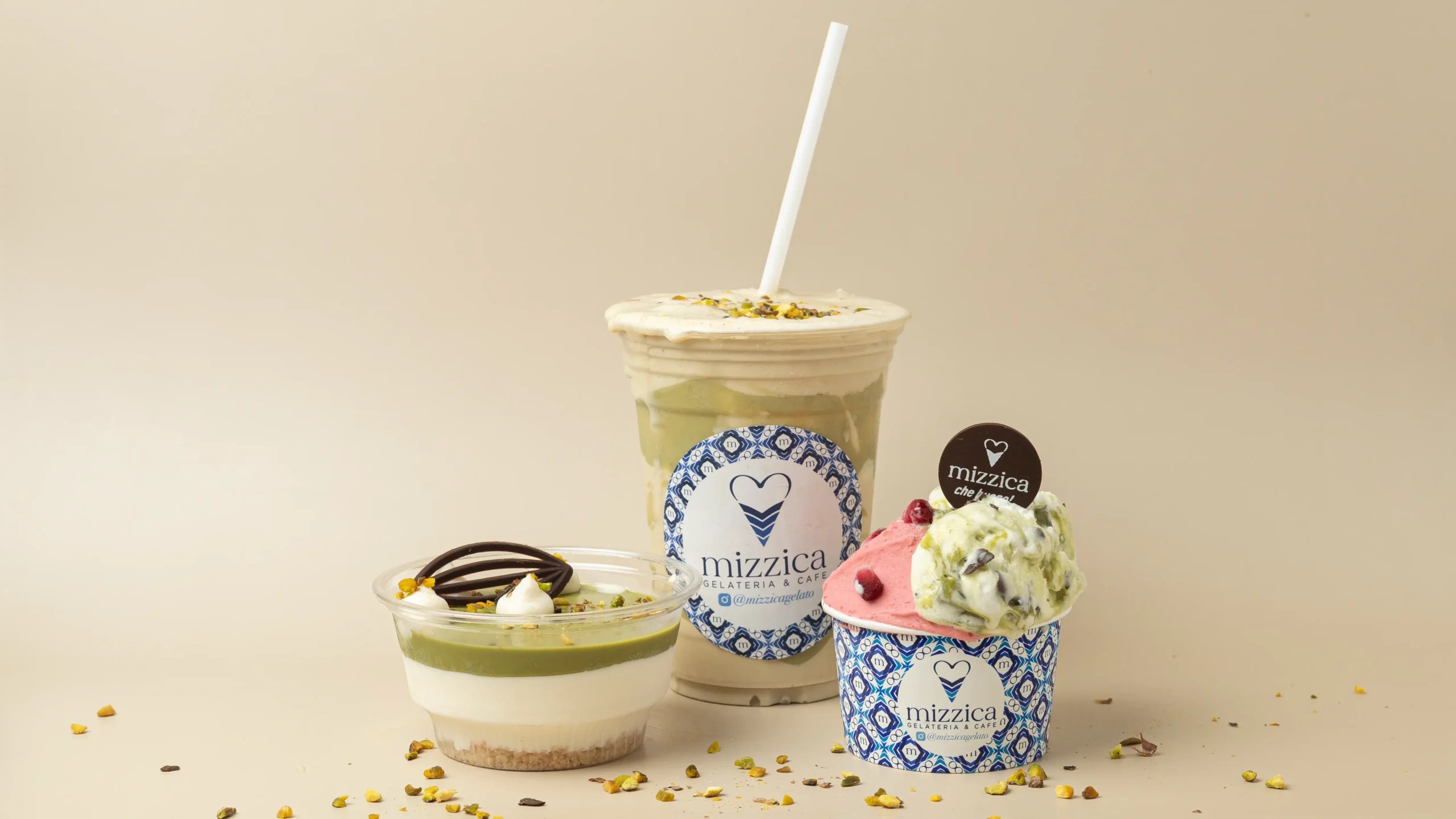 Mizzica pistachio gelato, a layered cup, and a house iced drink