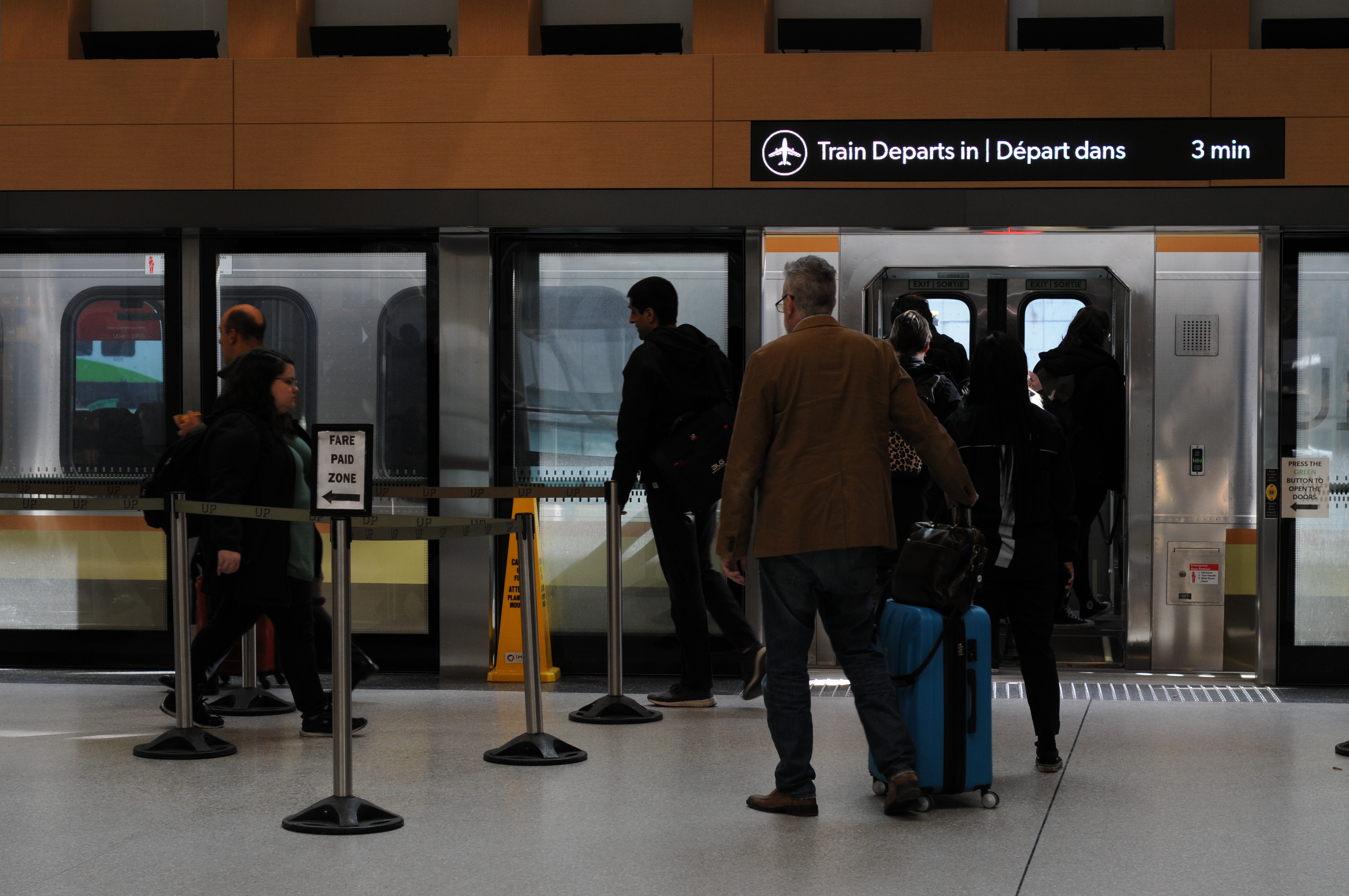 Passengers boarding the Union Pearson Express at Union Station